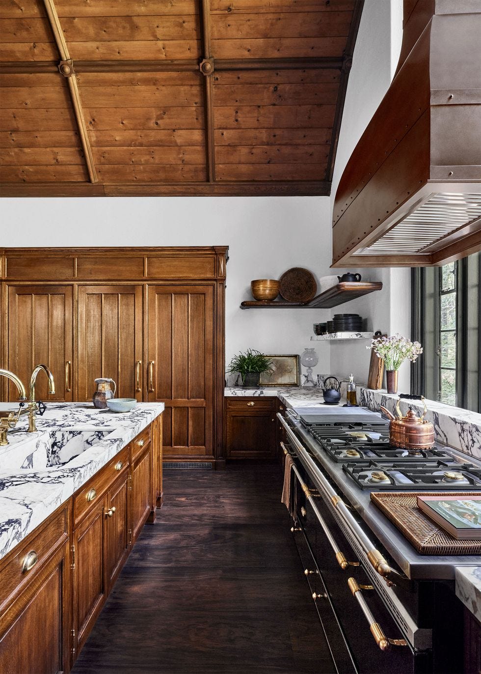 a kitchen with wooden cabinets