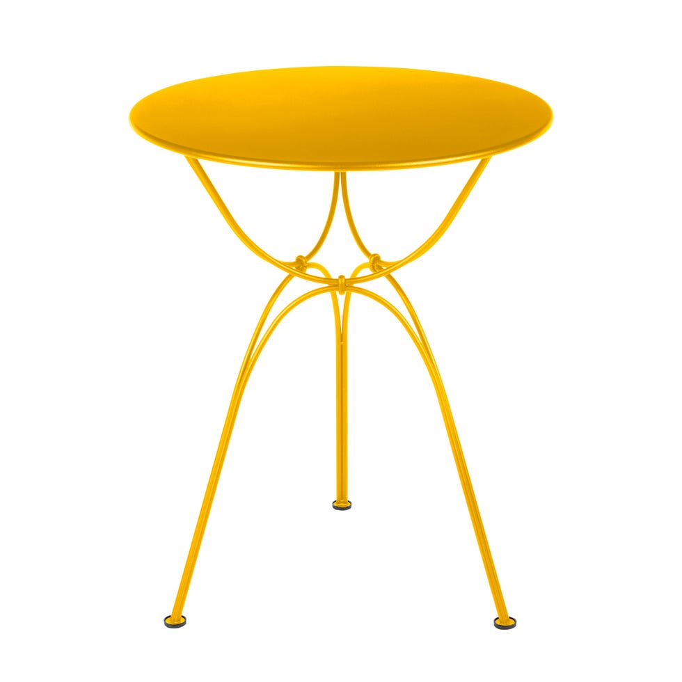 stylish yellow side table with a round top and slender legs