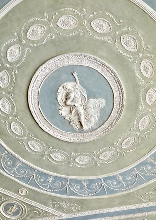 plasterwork and original wooden bas-reliefs on the ceiling