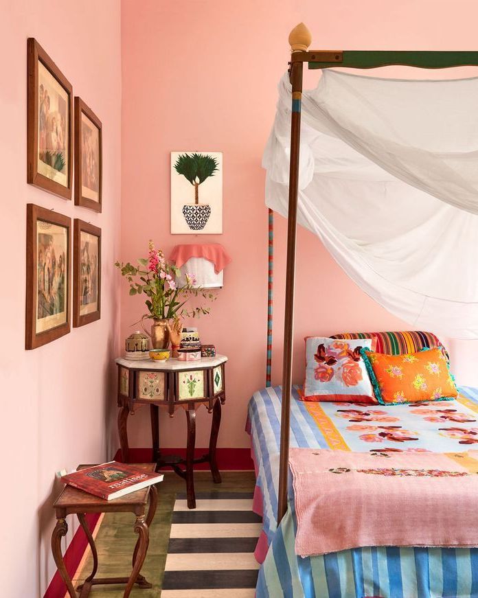bedroom with pink textile print linens