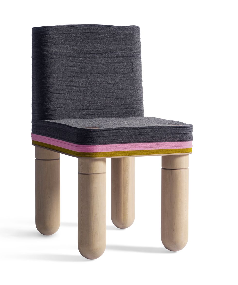 stubby looking chairs with rounded legs and gray seat with pink and camel colors underneath and gray back