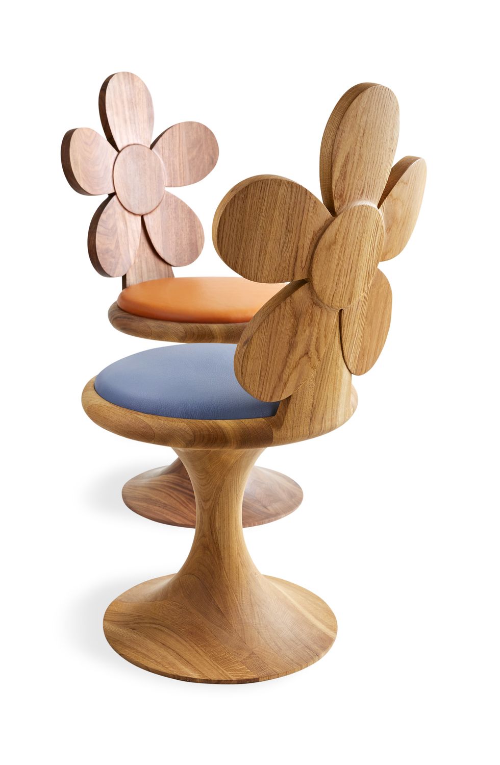 two wooden pedestal chairs with backs in the shape of a daisy and one seat is blue and one is a salmon color