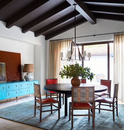 dining table, blue carpet and blue sideboard