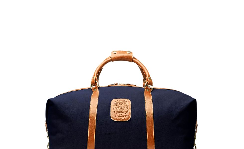 blue overnight bag with leather straps
