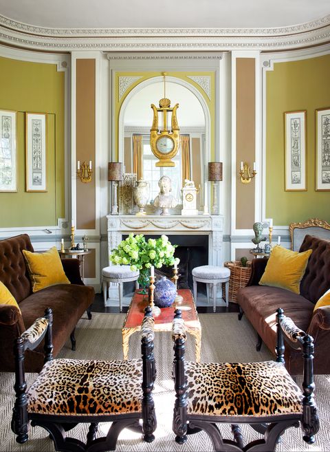grand salon with fireplace and leopard print stools