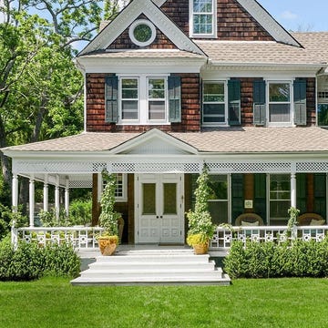 a large house with a front yard