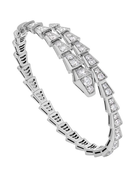 platinum bracelet with diamonds in triangular settings twined around twice with a snake head