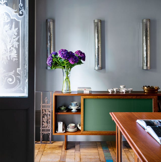 gray kitchen with wood floors and salvaged kitchen island designed by retrouvious