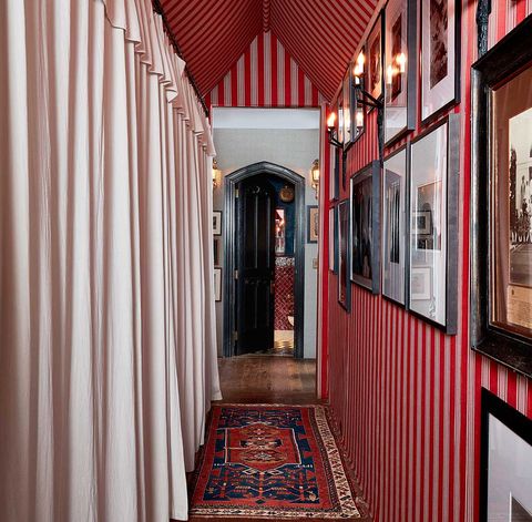 hallway with striped red wallpaper