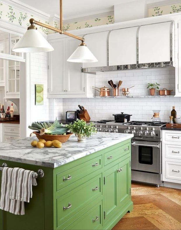 a kitchen with green cabinets a kitchen with green cabinets