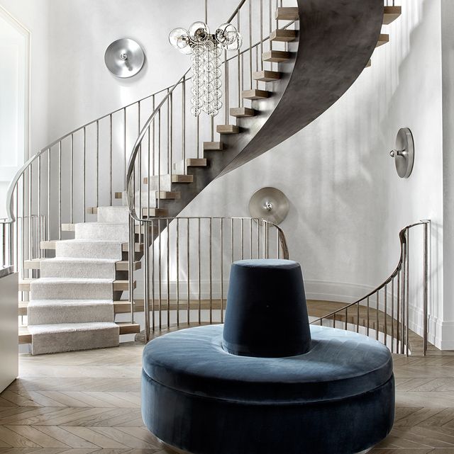 staircase with blue velvet circle chair designed by haynes roberts