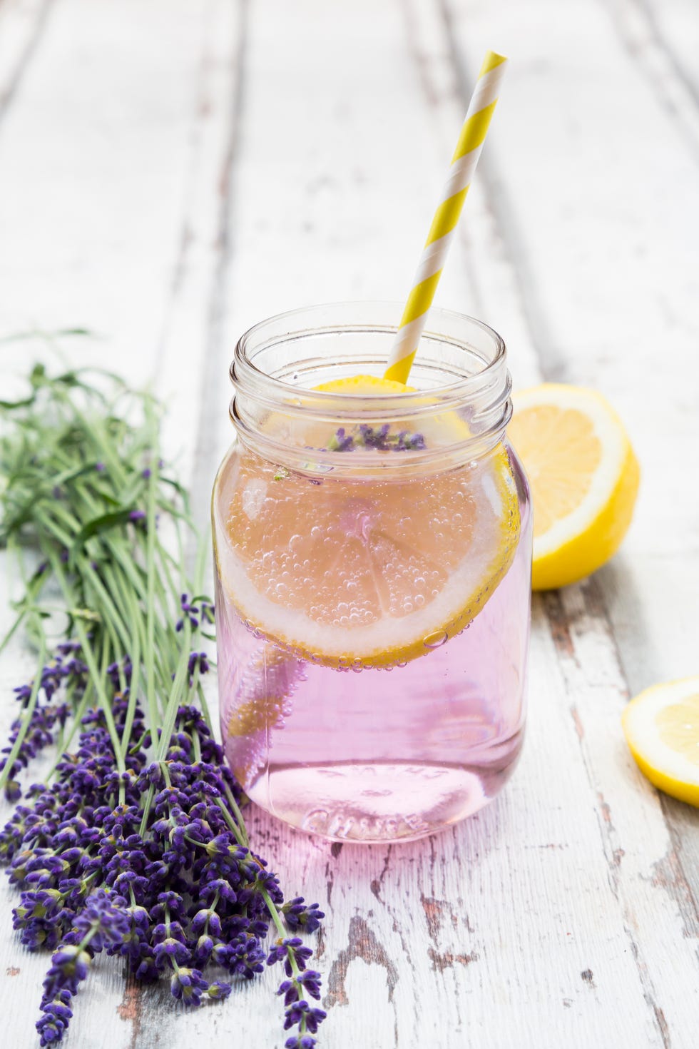 homemade edible flowers of lavender lemonade with lemon