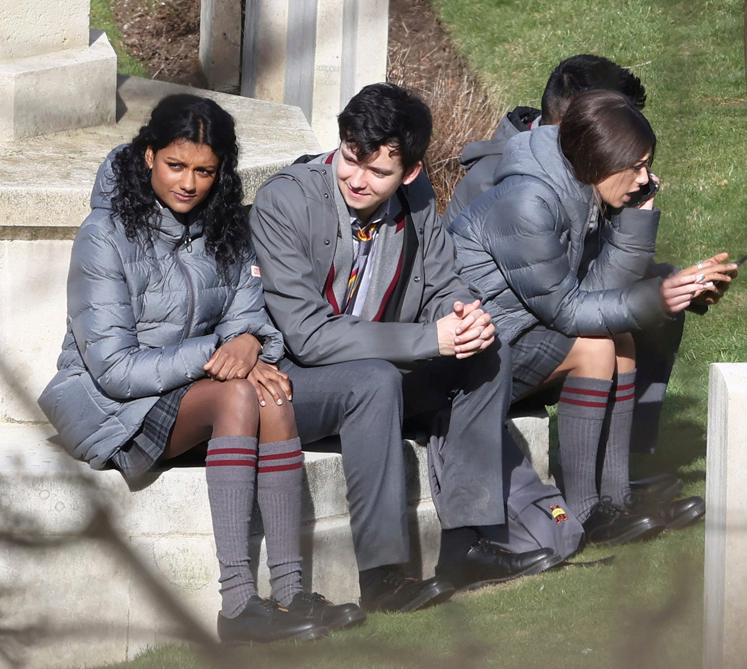 actors simone ashley and asa butterfield on the set tv show 'sex education' in kent