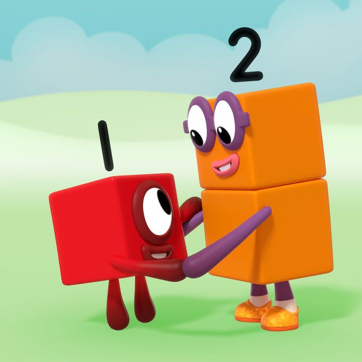 a red block and two orange blocks are holding hands in a field