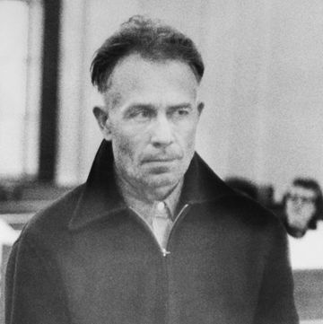 ed gein looking up at the judge as he stands in court