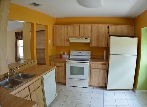kitchen with orange walls
