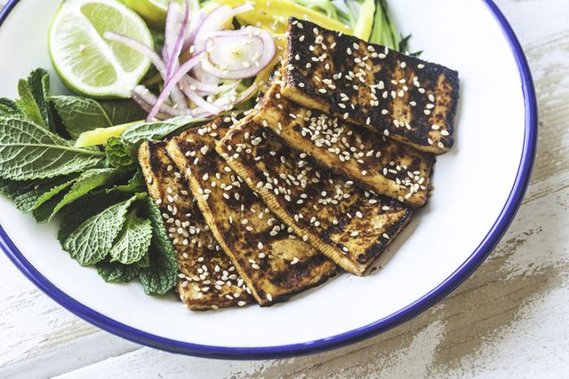 marinated grilled tofu strips with a sweet and zesty salad of mango and cucumber with a little pickled red onion and lime
