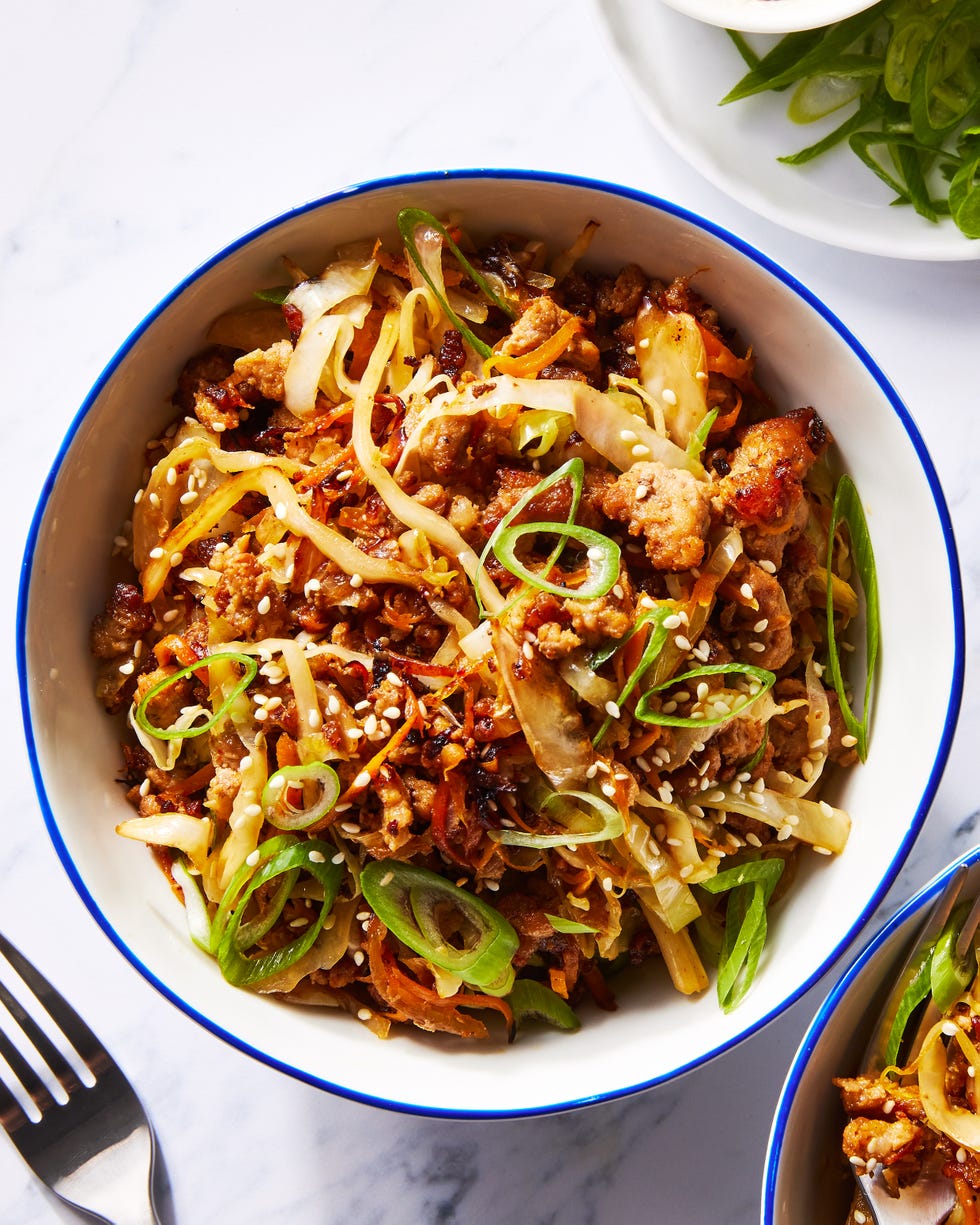 ground pork, cabbage and carrot in a bowl