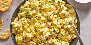 egg salad topped with chives and paprika
