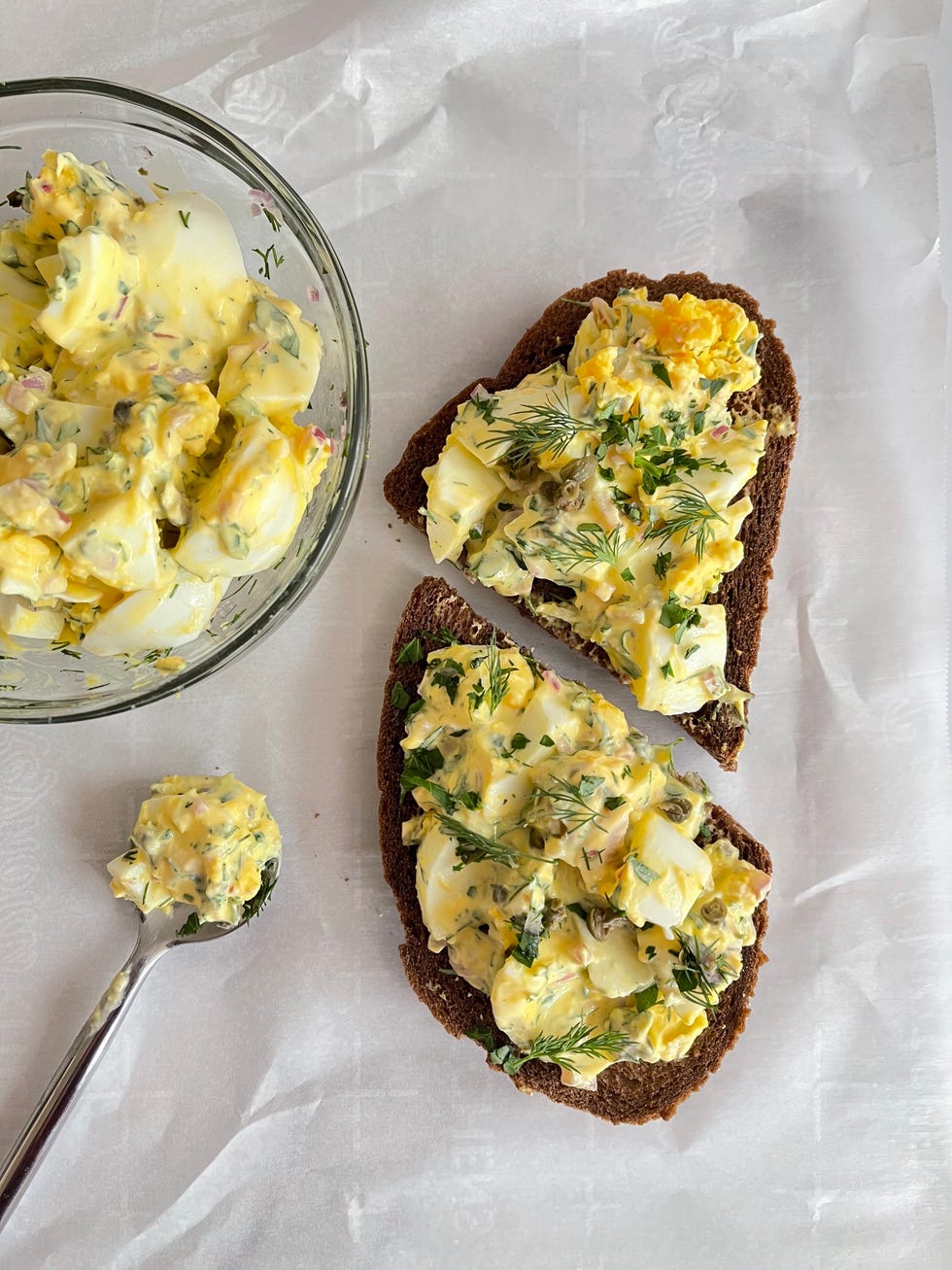 egg salad served on a piece of toasted bread