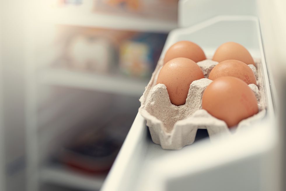brown eggs in the fridge door