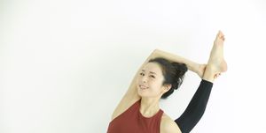 a woman stretching her arms