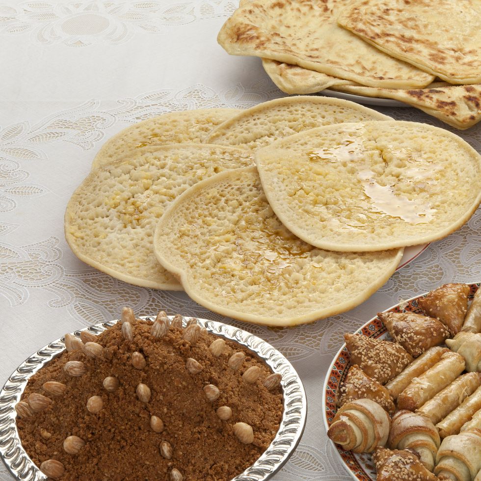 traditional moroccan tea, cookies, almond sellou and pancakes at eid al fitr the end of ramadan