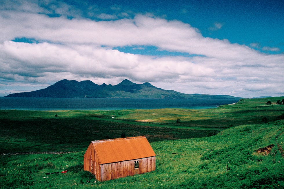 Grassland, Sky, Green, Nature, Natural landscape, Mountain, Mountainous landforms, Grass, Cloud, Natural environment, 