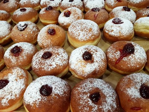eight days of hanukkah' sufganiyot', the  round doughnuts