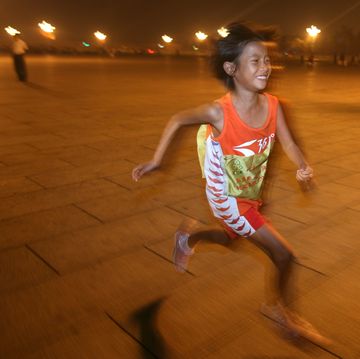 eight year old child runs across china