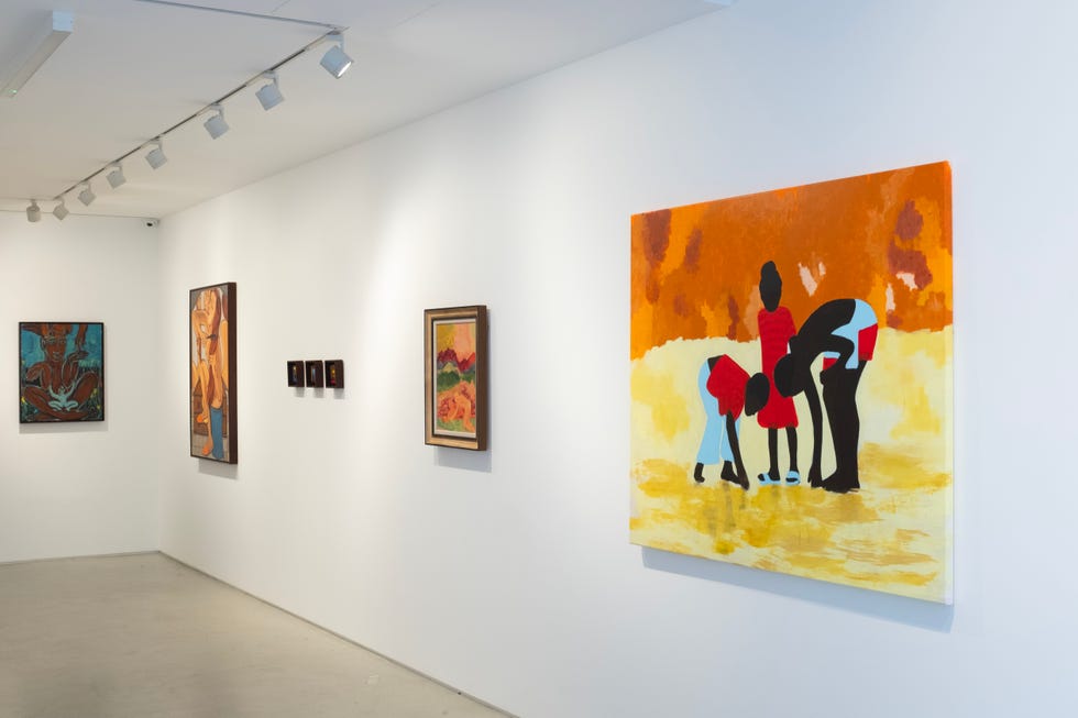 art gallery showcasing various artworks on white walls