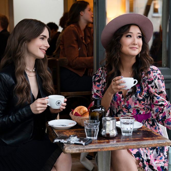 emily in paris l to r ashley park as mindy chen and lily collins as emily in episode 106 of emily in paris cr stephanie branchunetflix © 2020