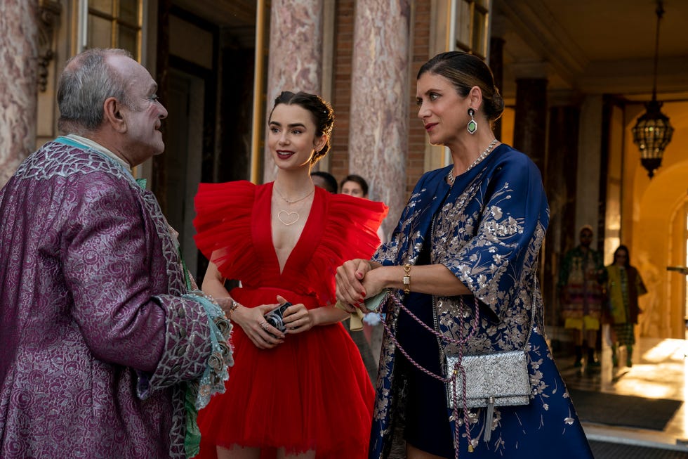 emily in paris l to r jean christophe bouvet as pierre cadault, lily collins as emily, kate walsh as madeline in episode 210