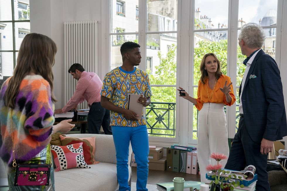 emily in paris l to r lily collins as emily, samuel arnold as julien, philippine leroy beaulieu as sylvie grateau, bruno gouery as luc in episode 301 of emily in paris cr stéphanie branchunetflix © 2022