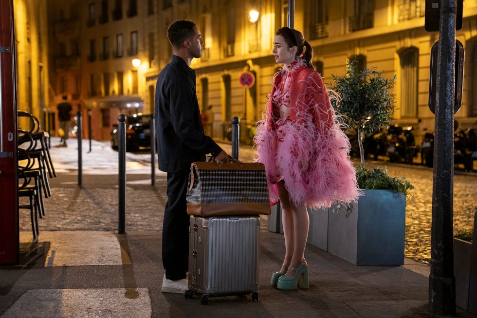 emily in paris l to r lucien laviscount as alfie, lily collins as emily in episode 301 of emily in paris