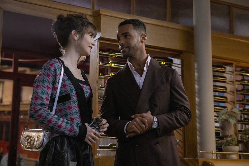 emily in paris l to r lily collins as emily, lucien laviscount as alfie in episode 310 of emily in paris cr marie etchegoyennetflix © 2022
