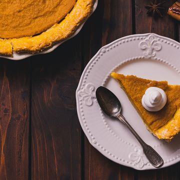 thanksgiving holiday pumpkin pie with whipped topping