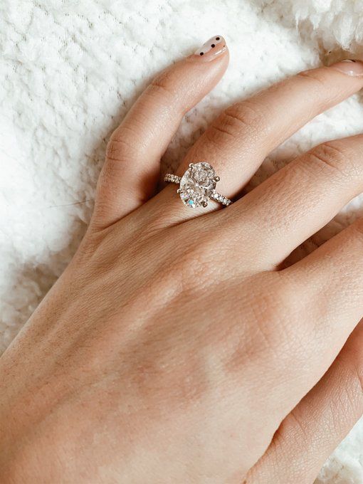 Ring, Jewellery, Finger, Engagement ring, Fashion accessory, Hand, Wedding ring, Wedding ceremony supply, Diamond, Body jewelry, 