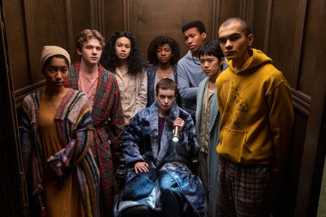 the midnight club l to r iman benson as ilonka, igby rigney as kevin, annarah cymone as sandra, ruth codd as anya, adia as cheri ian, chris sumpter as spencer, aya furukawa as natsuki, sauriyan sapkota as amesh in episode 104 of the midnight club cr eike schroternetflix © 2022