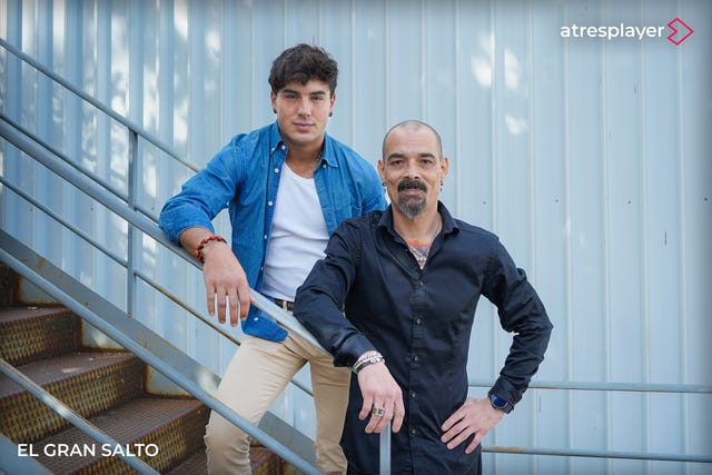 two men standing next to each other