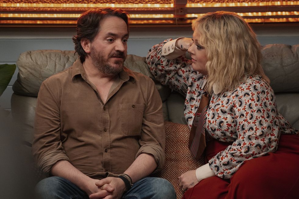 god’s favorite idiot l to r ben falcone as clark thompson, melissa mccarthy as amily luck in episode 102 of god’s favorite idiot cr vince valituttinetflix © 2022