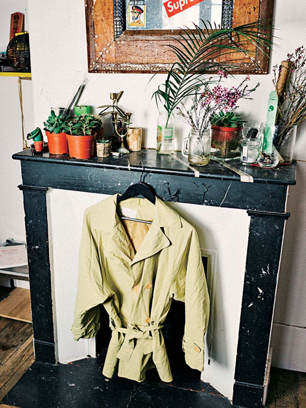 Room, Furniture, Outerwear, Table, Jacket, Coat, Interior design, House, Style, Houseplant, 