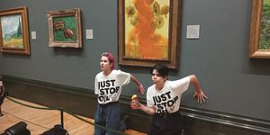 activists of "just stop oil" glue their hands to the wall after throwing soup at a van gogh's painting "sunflowers" at the national gallery in london, britain october 14, 2022 just stop oilhandout via reuters this image has been supplied by a third party mandatory credit