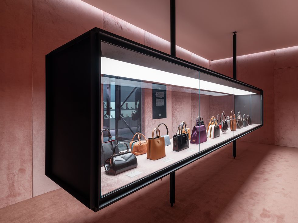 a display case with purses