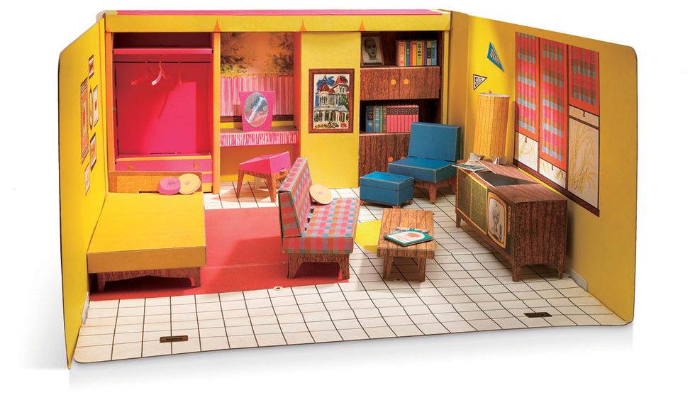 a child's room with a playroom and a table
