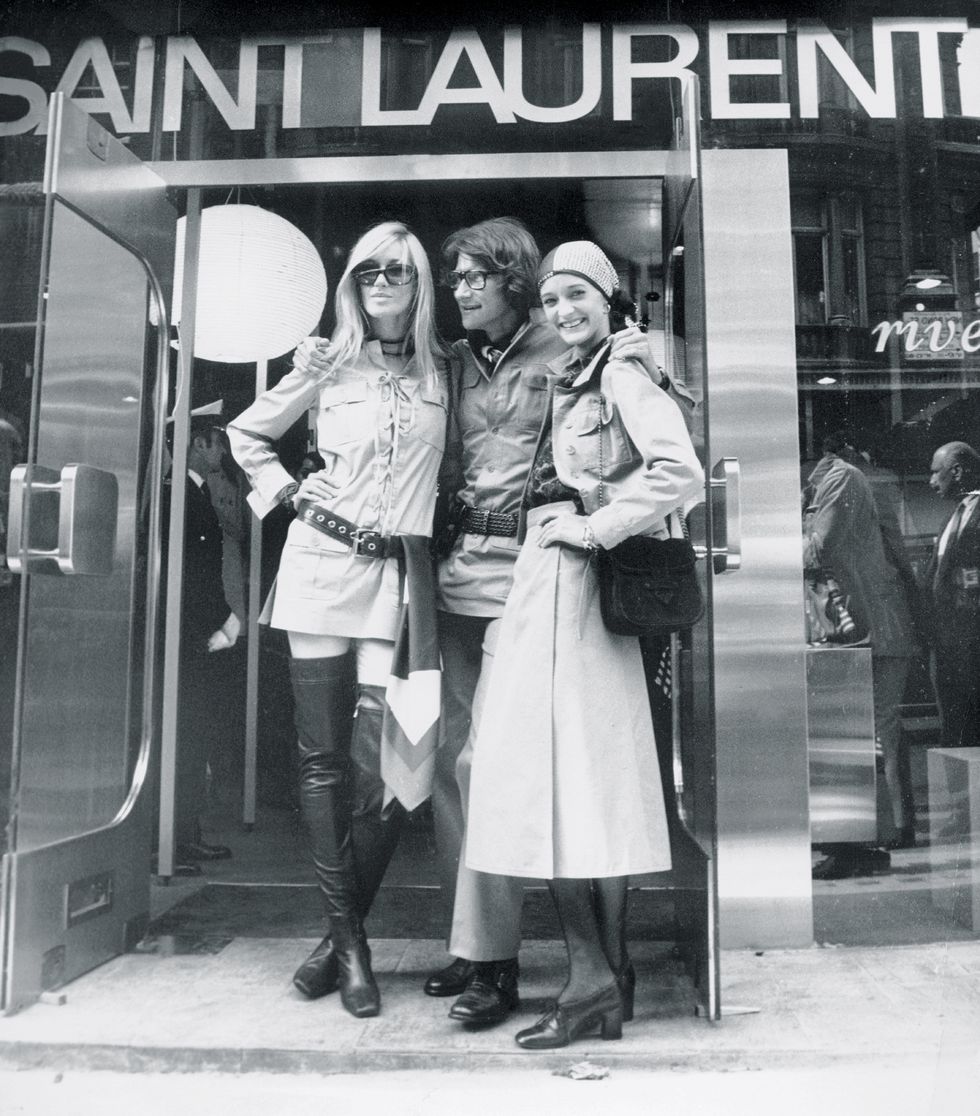 london, united kingdom september 10 french fashion designer yves saint laurent posing in front of his new shop in bond street on september 10, 1969 in london, united kingdom he is with two model friends betty catroux left and loulou de la falaise it was the first ready to wear shop that the fashion designer had opened in london and he called it yves saint laurent rive gauche, as his first shop in paris photo by keystone francegamma keystone via getty images