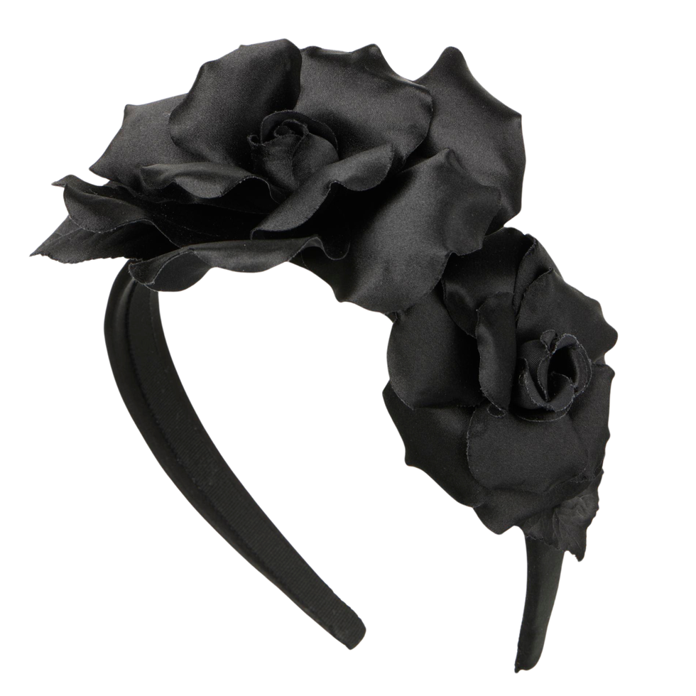 a black rose with a black stem