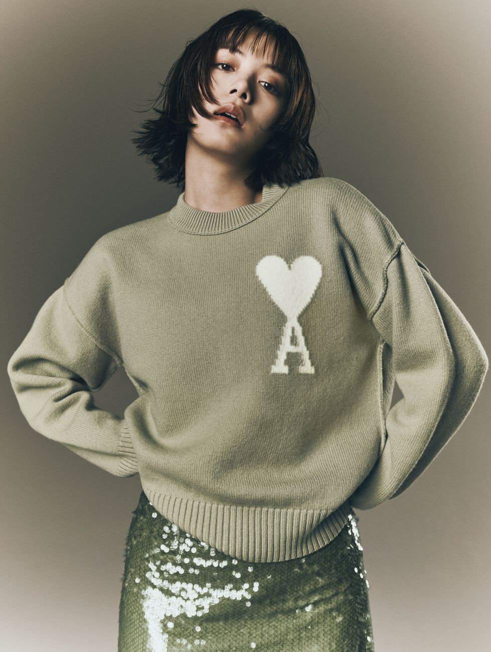 a person wearing a sweater