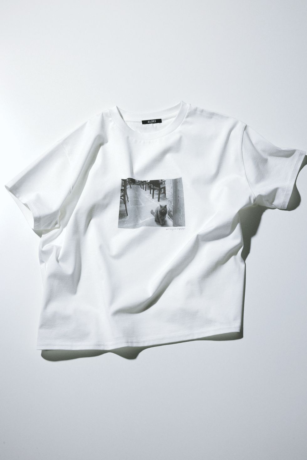 a white t shirt with a picture of a person on it