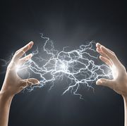 electric energy sparks from a hand
